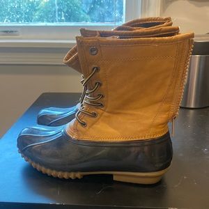 Brown and black duck boots. Fleece lined, perfect for snow and rain